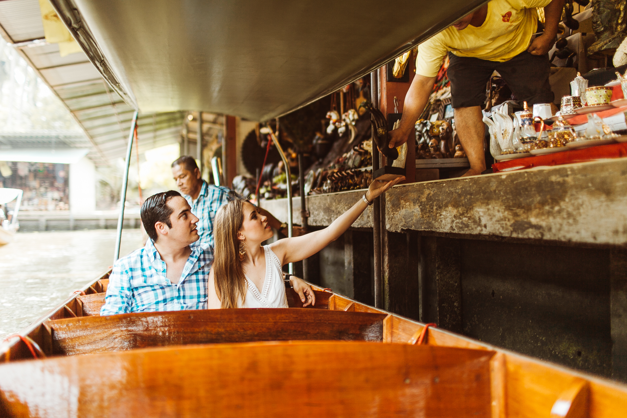 boy and girl in floating market thailand