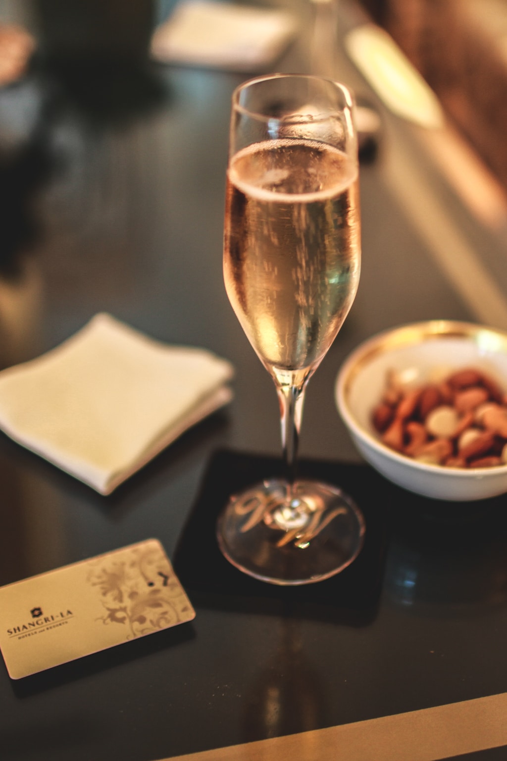 Glass of champagne and nuts